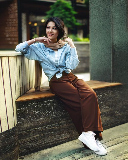 Free Elegant outdoor portrait of a woman in Tabriz embracing modern Iranian fashion. Stock Photo