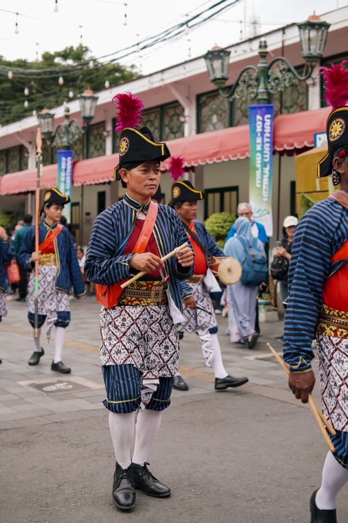 Free Vibrant cultural parade in Yogyakarta with participants in traditional attire showcasing heritage. Stock Photo