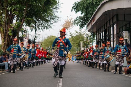 Free Colorful Indonesian parade with traditional costumes in Yogyakarta, capturing vibrant cultural heritage. Stock Photo