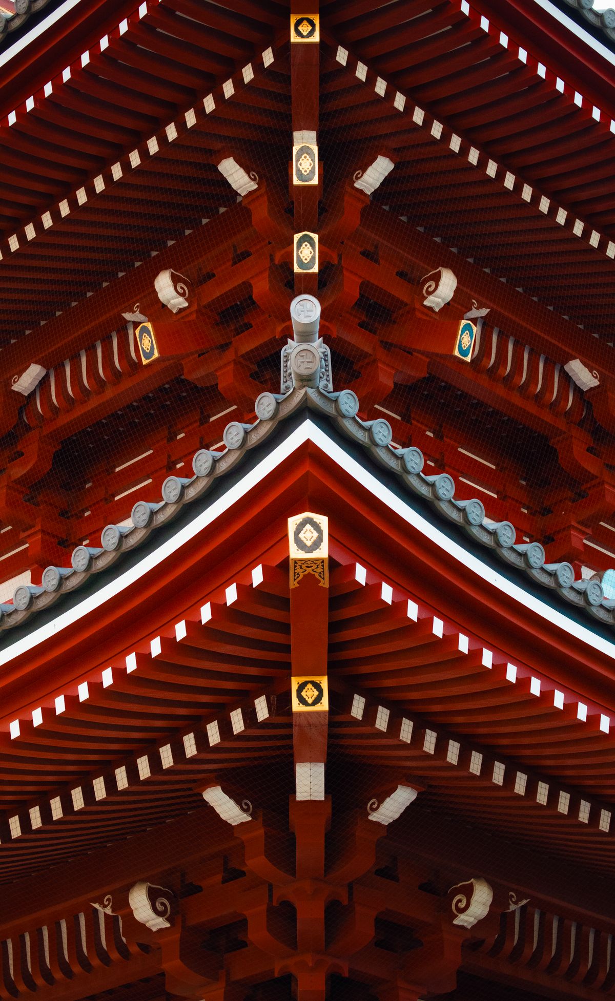 Traditional Japanese wooden architecture with stone path