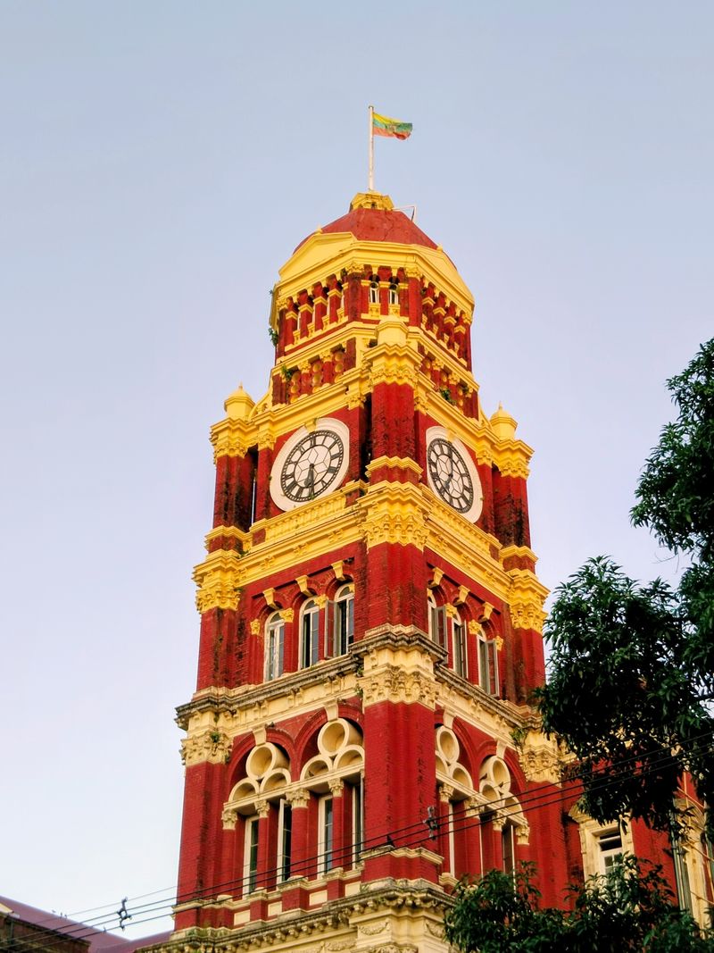 Clock tower of Yangon Central Railway Station at dusk