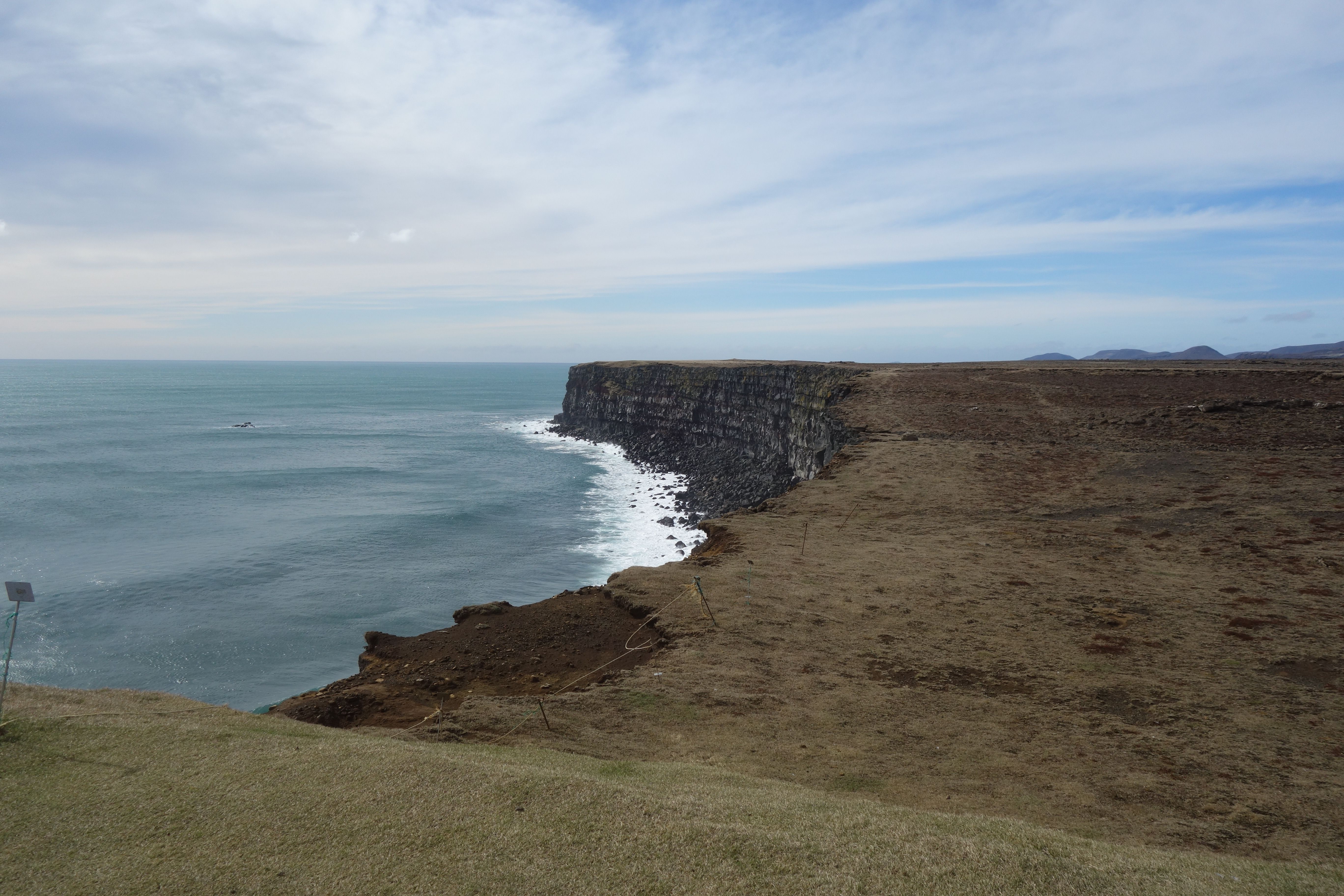 Dramatic Coastal Cliffs on a Remote Island · Free Stock Photo
