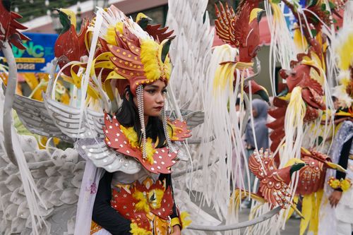 Free Colorful costumes in Yogyakarta cultural parade showcasing vibrant traditions and heritage. Stock Photo