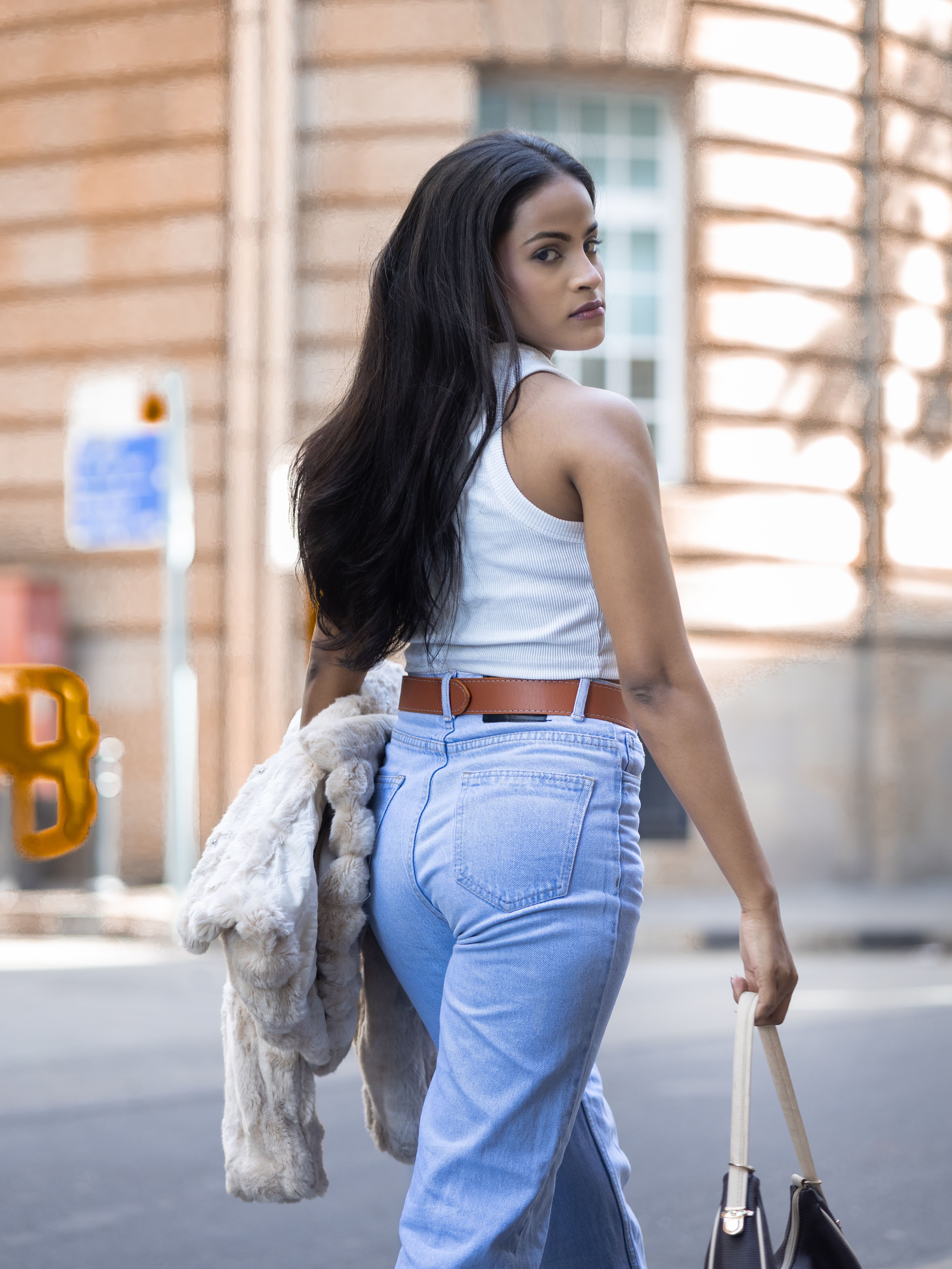 Stylish Woman Walking in Urban Street · Free Stock Photo