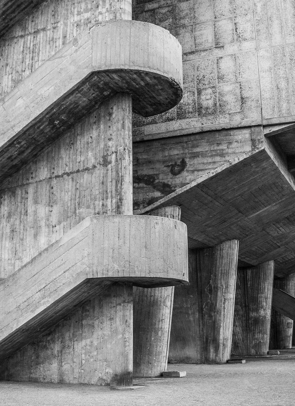 Explore the stark beauty of brutalist architecture with this black and white photo of a concrete staircase.. pexels, explore,