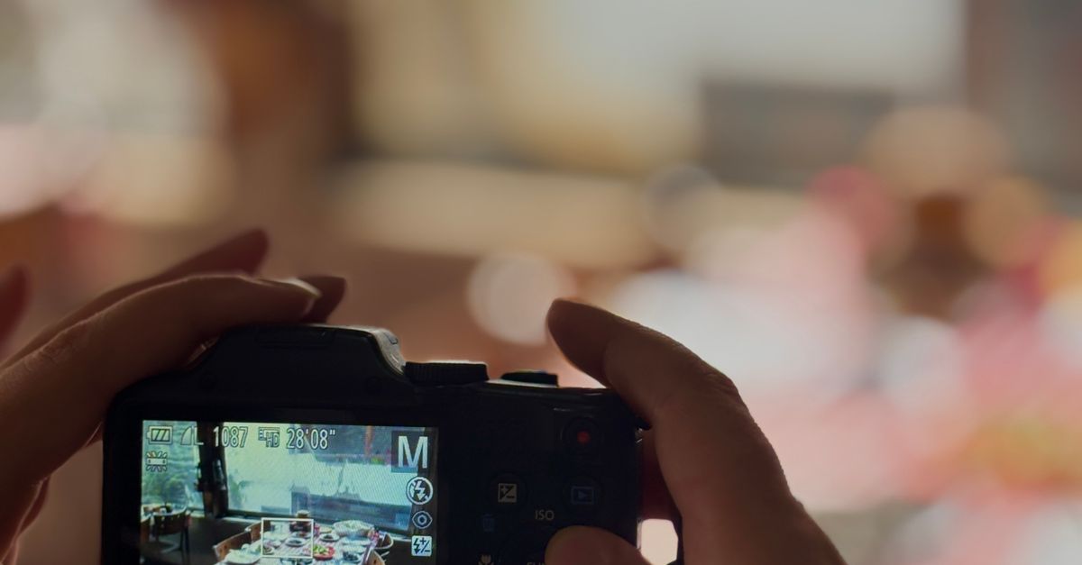 Capture Image Table Capturing a Vibrant Table Setting on Camera · Free Stock Photo