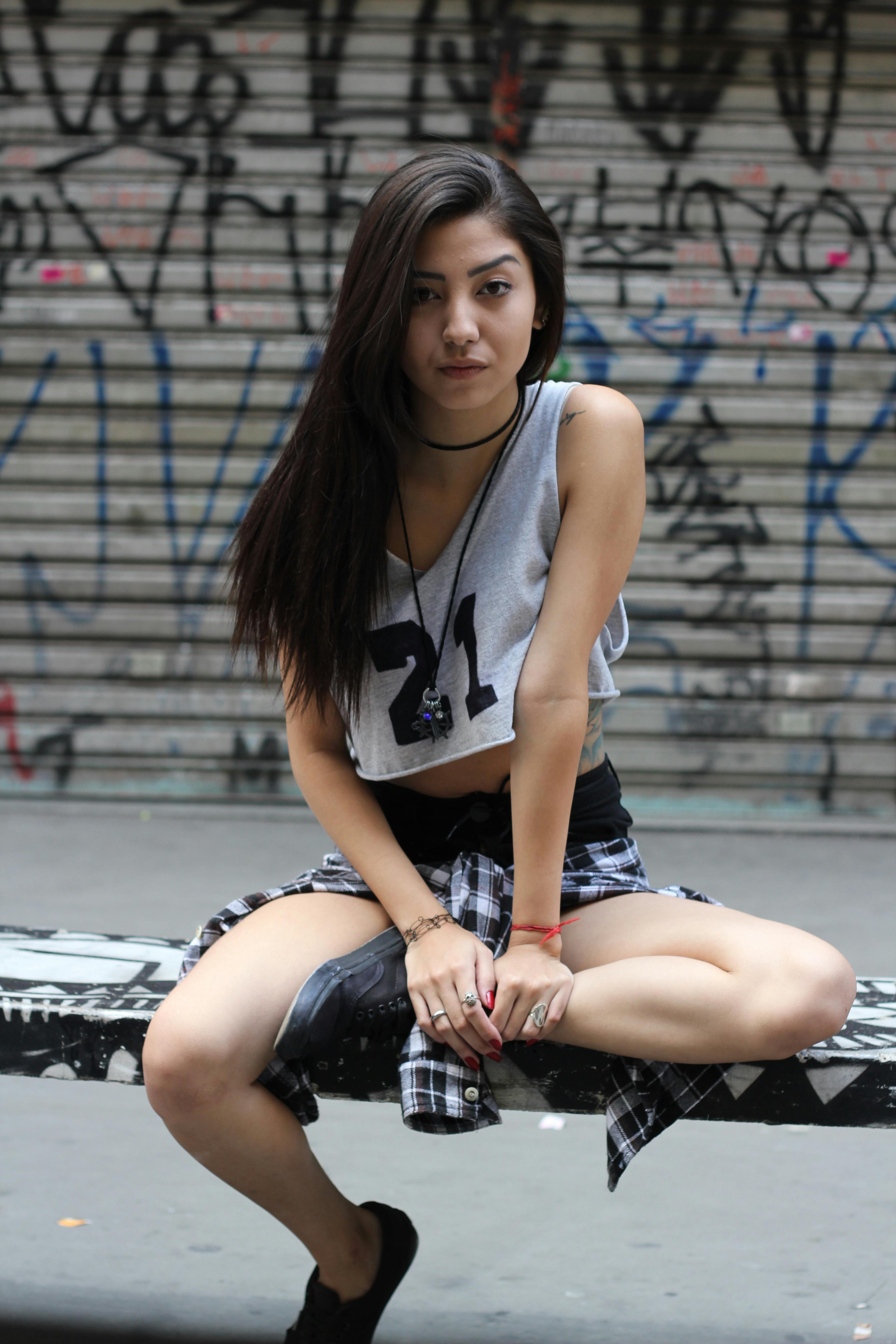 Woman Sitting Down on Bench · Free Stock Photo