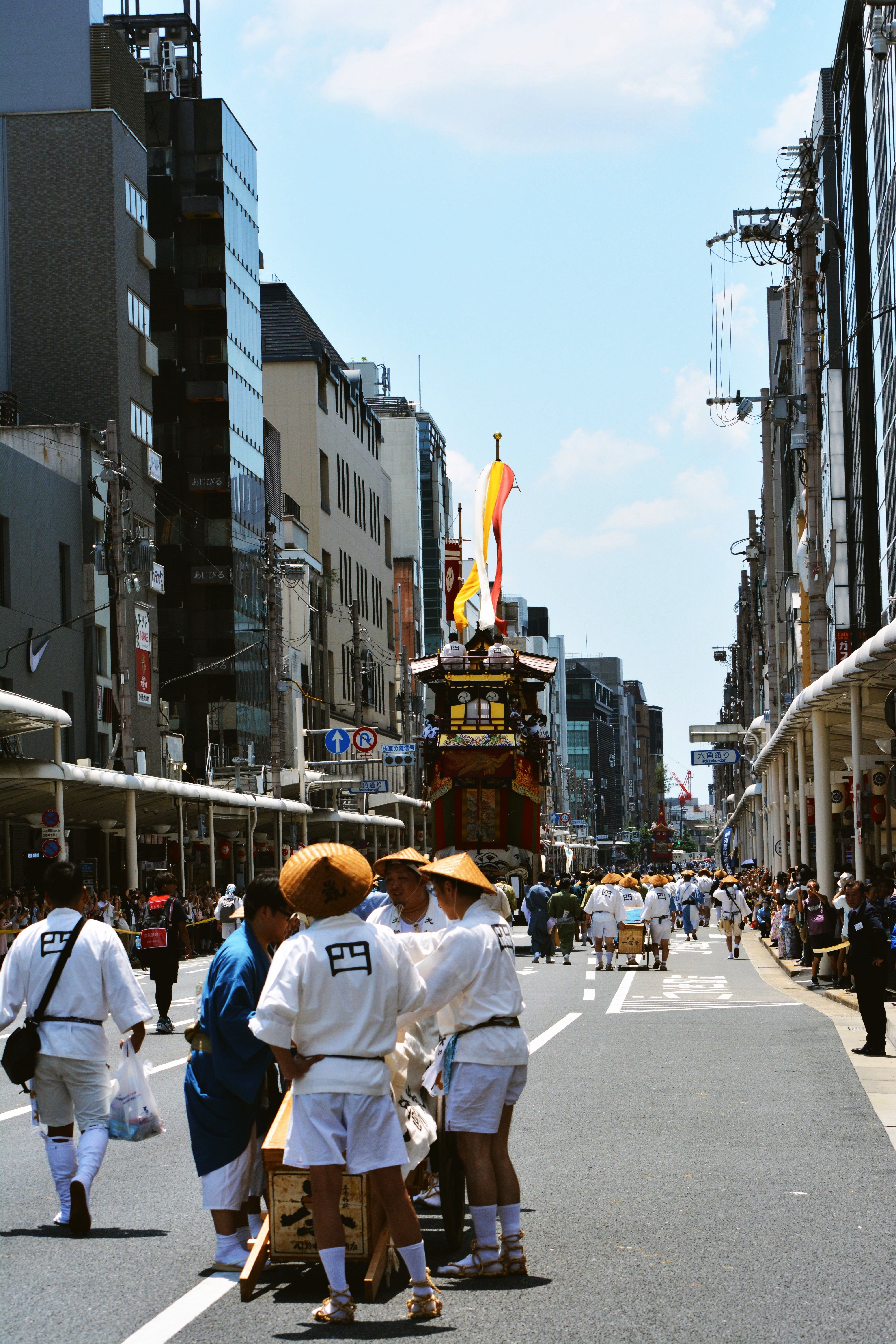 Traditional Festival Parade on Busy City Street · Free Stock Photo