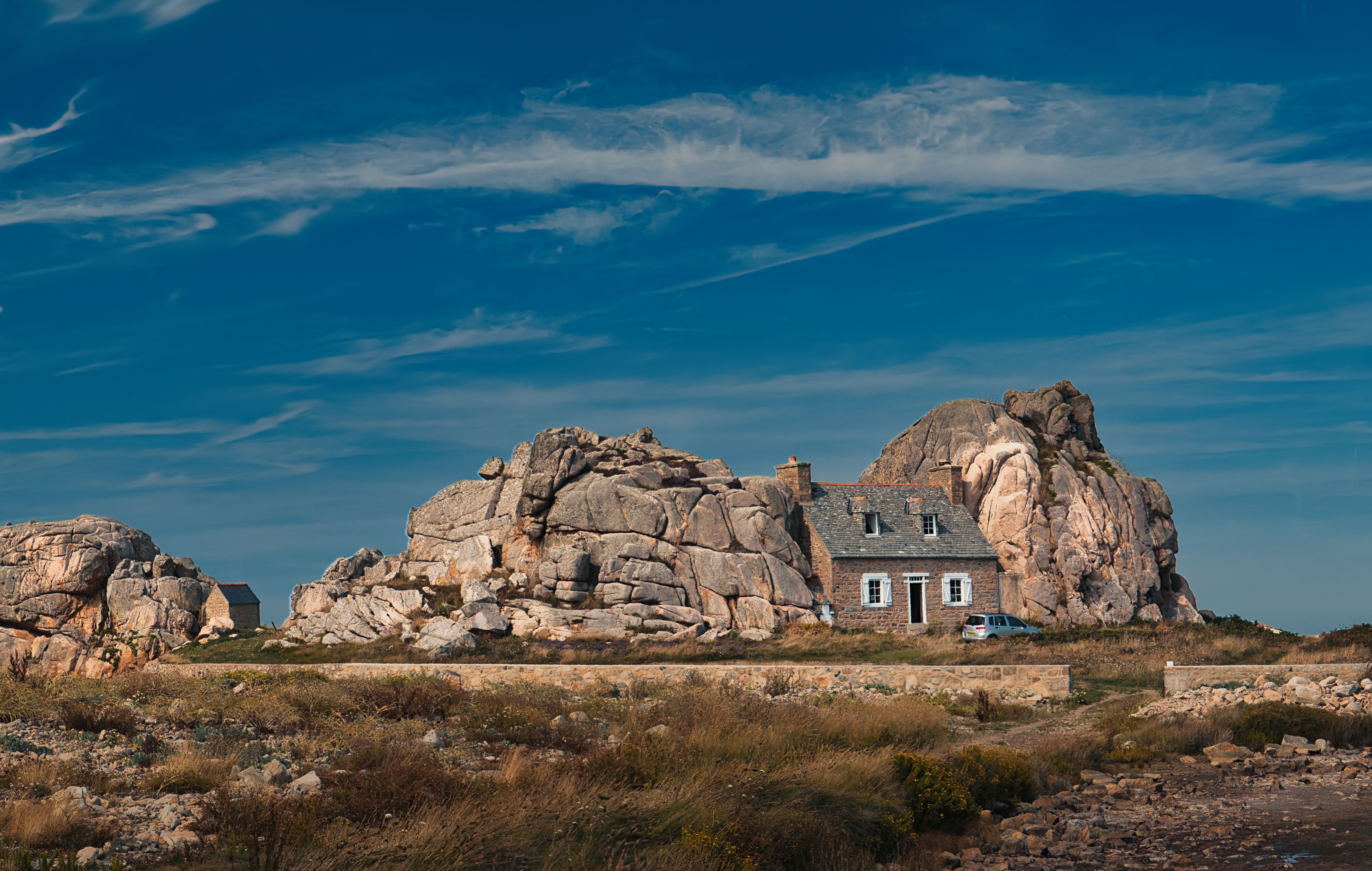 Charming Stone House Amidst Majestic Rocks · Free Stock Photo
