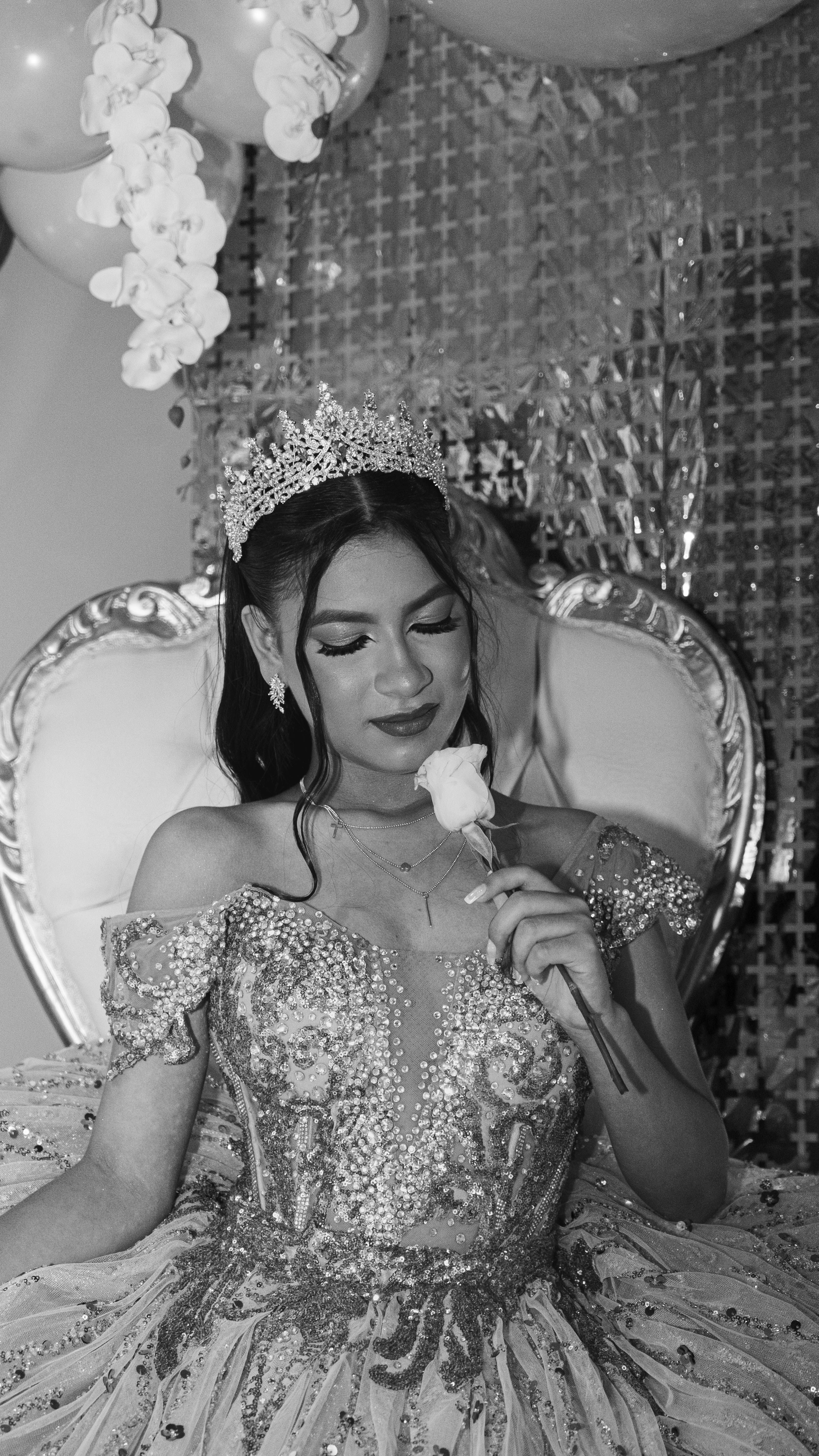 Elegant Young Woman in Formal Gown with Tiara