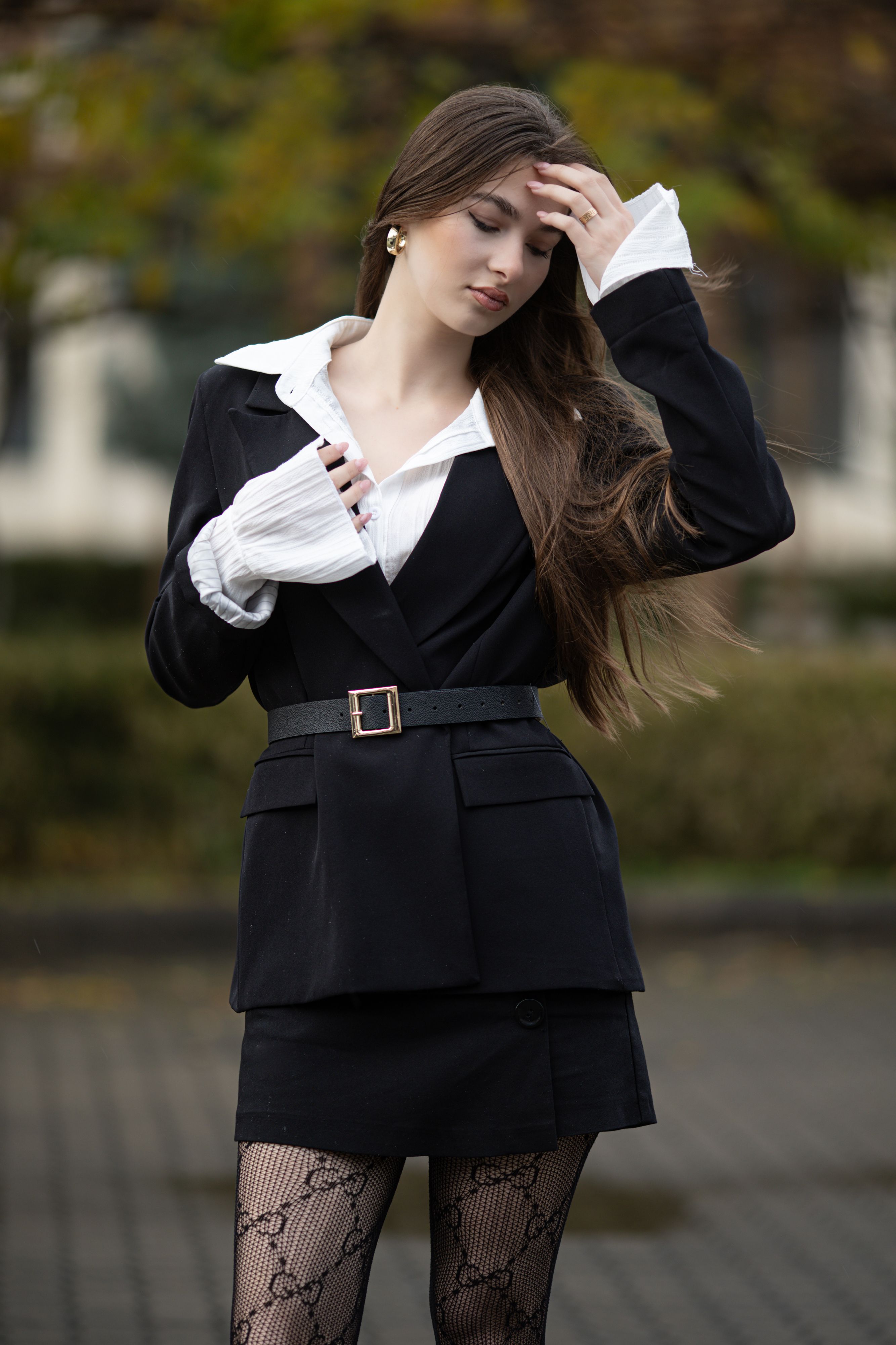 Elegant Woman in Business Attire at Night · Free Stock Photo