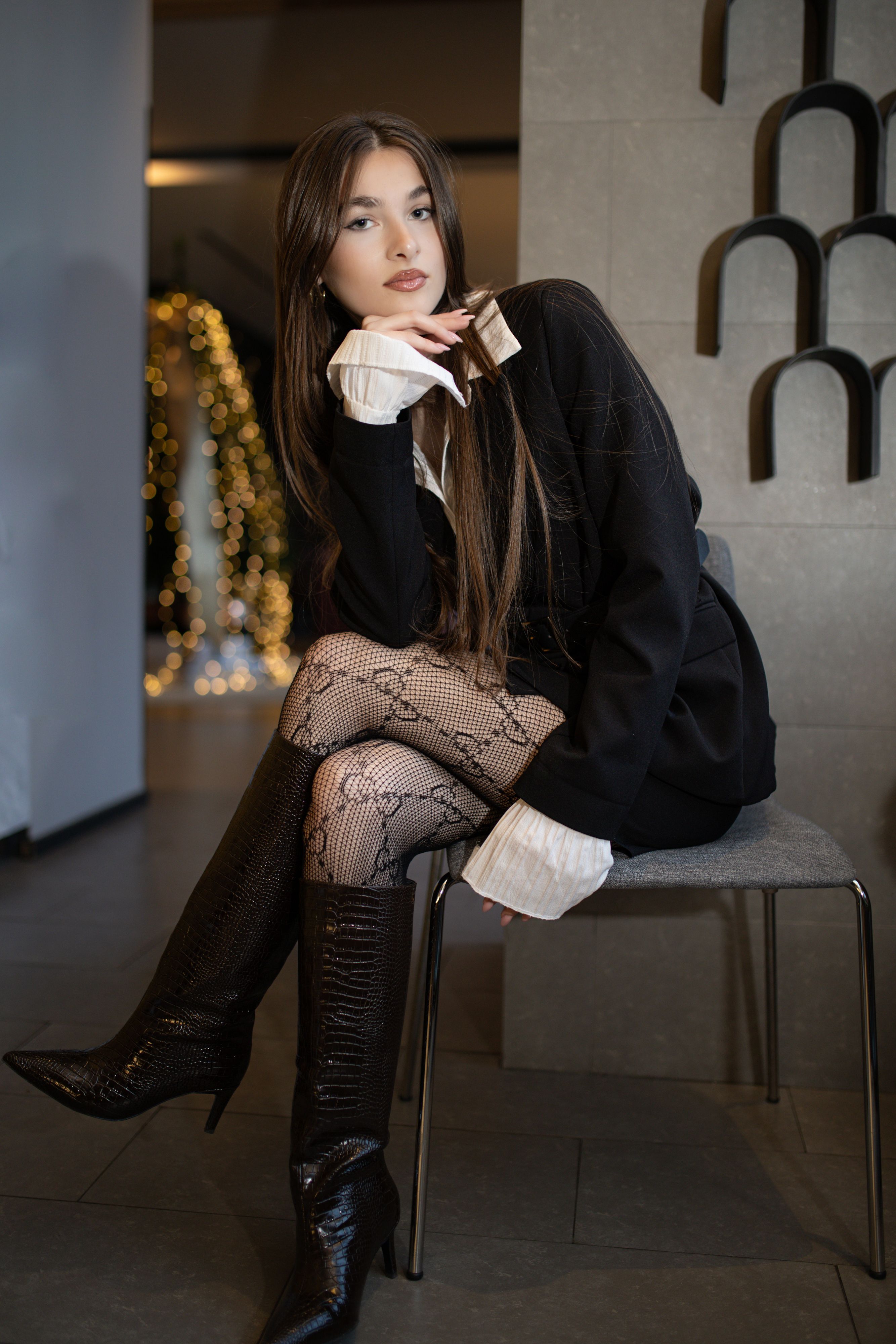 Elegant Indoor Portrait with Fashionable Outfit · Free Stock Photo