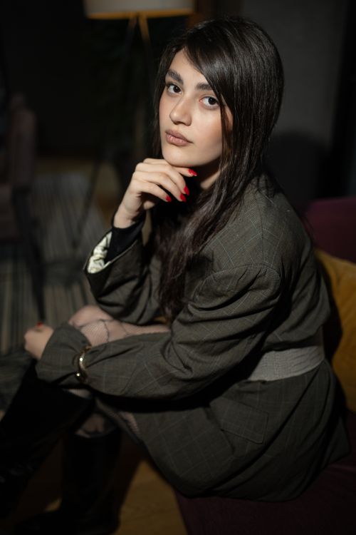 Free Sophisticated portrait of a young woman in an elegant setting, capturing natural beauty and style in Tbilisi, Georgia. Stock Photo