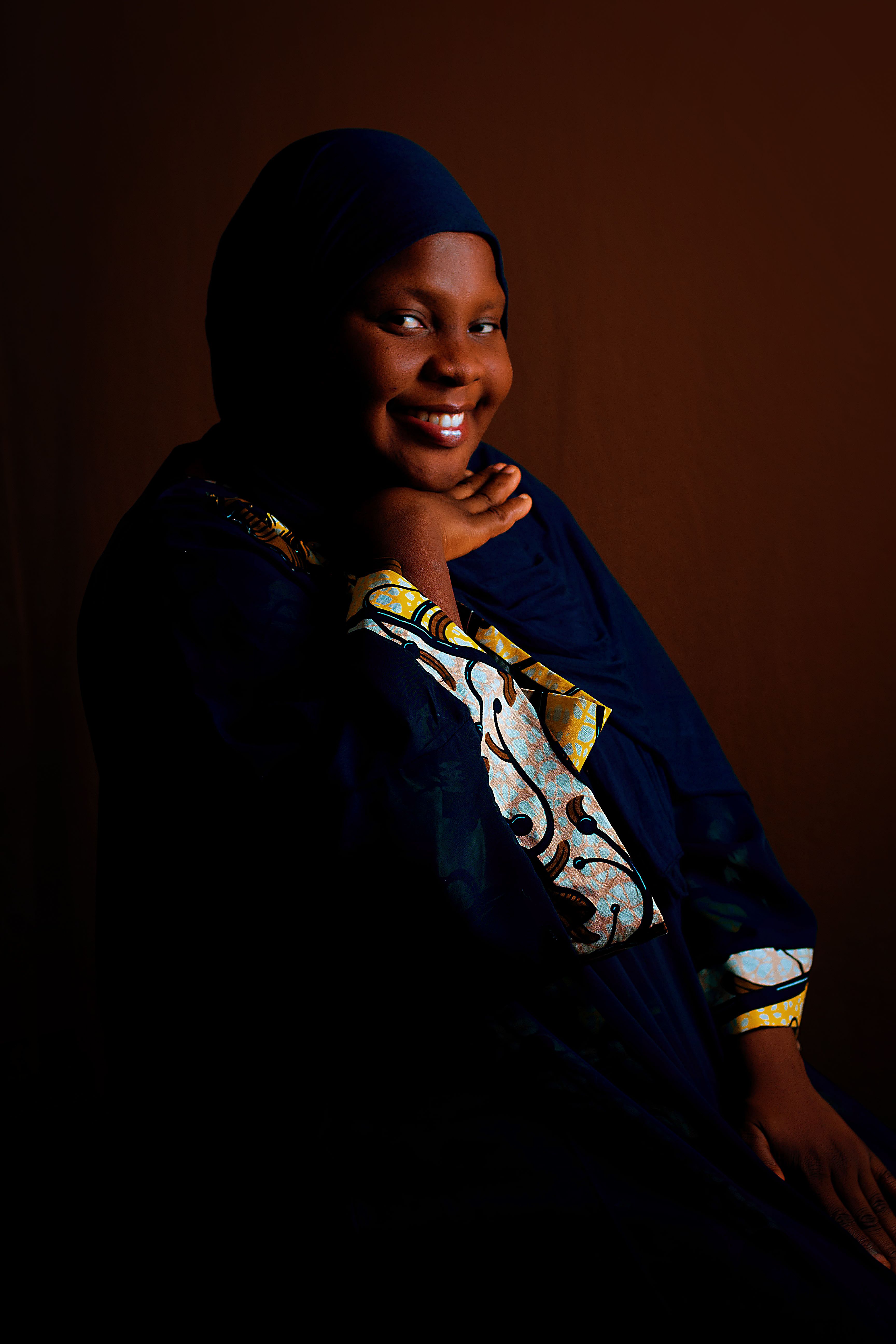 Elegant Portrait of a Smiling Woman in Traditional Attire · Free Stock ...