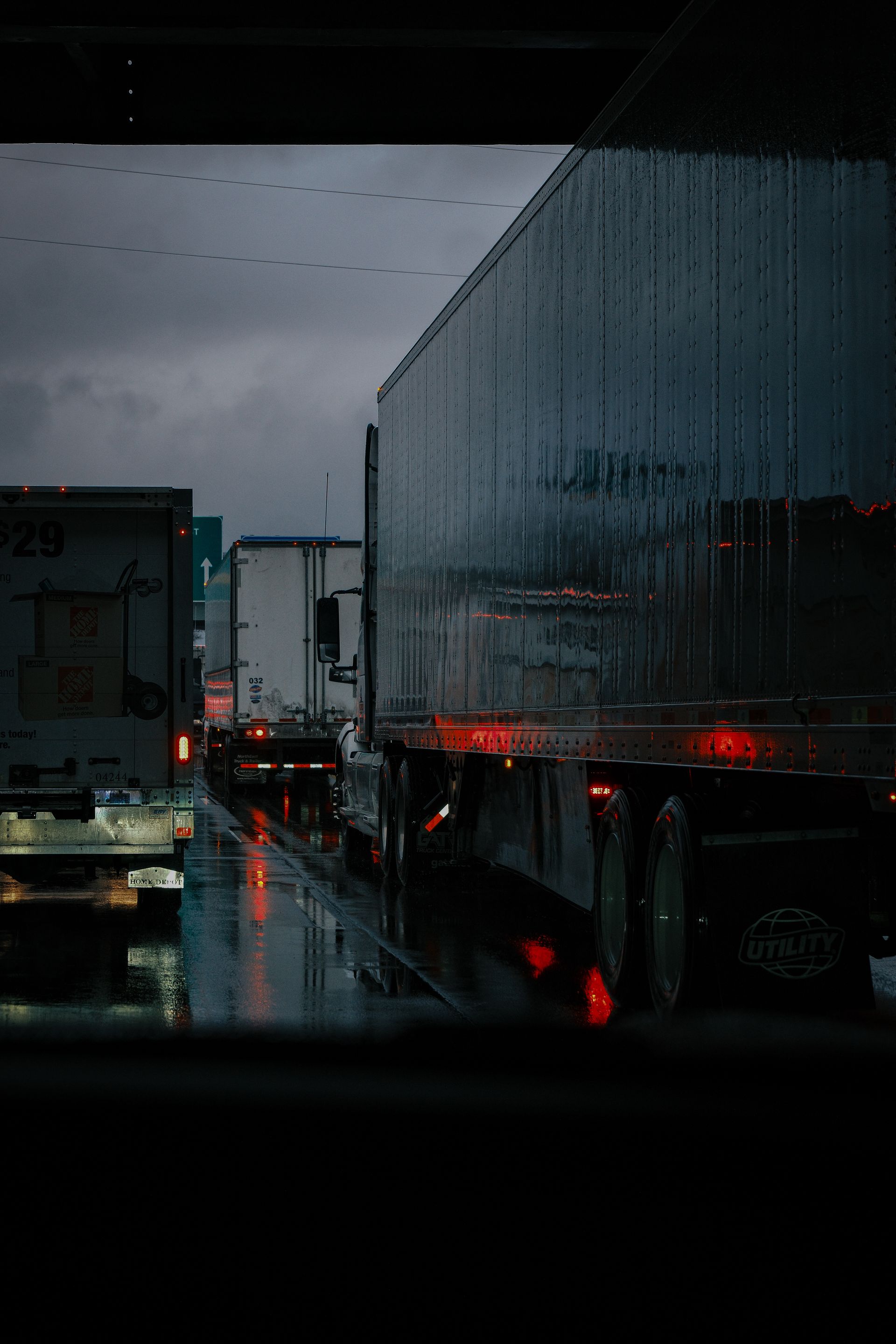 Semi trucks on rainy highway