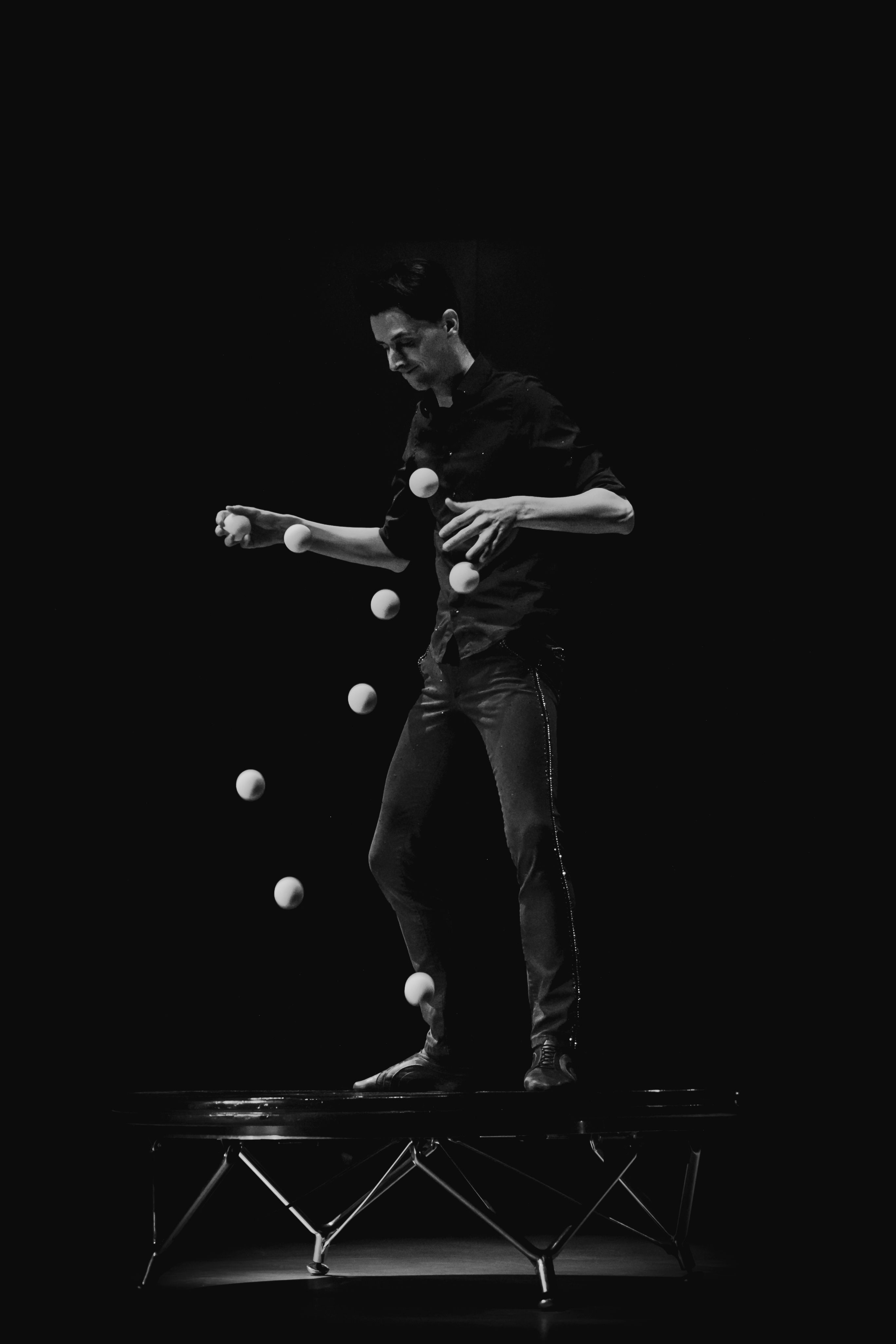 Black and White Juggling Performance Display · Free Stock Photo