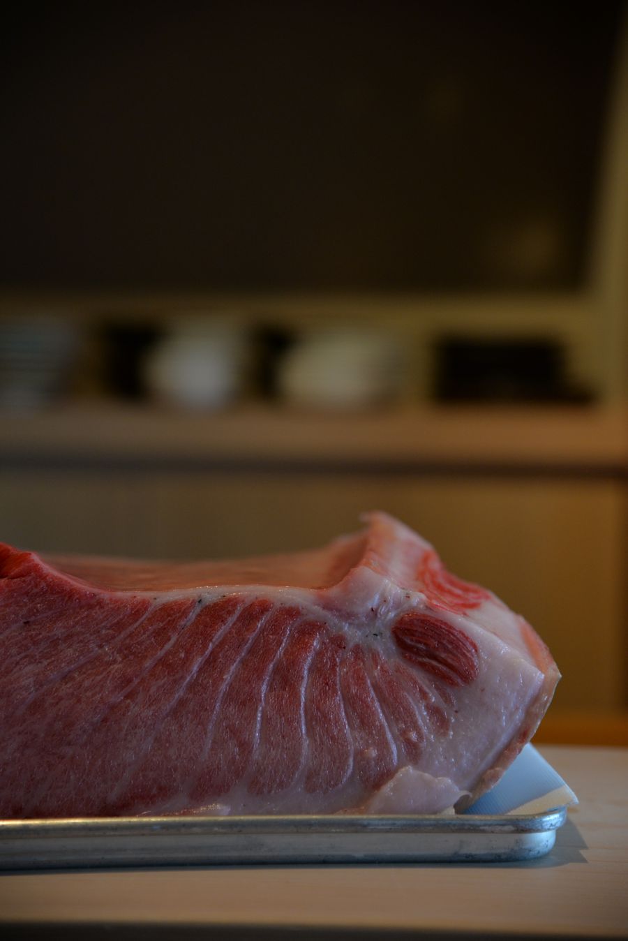 Close-up of deep-red raw tuna flesh