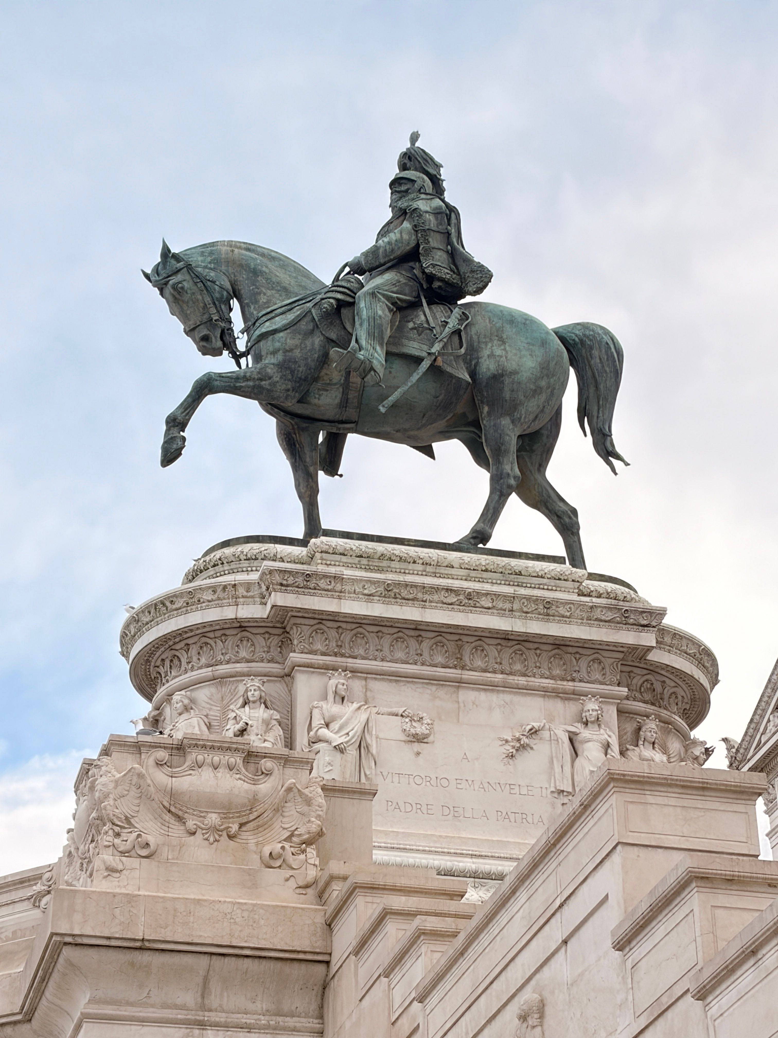 Equestrian statue of Vittorio Emanuele II in Rome, capturing historic Italian architecture.