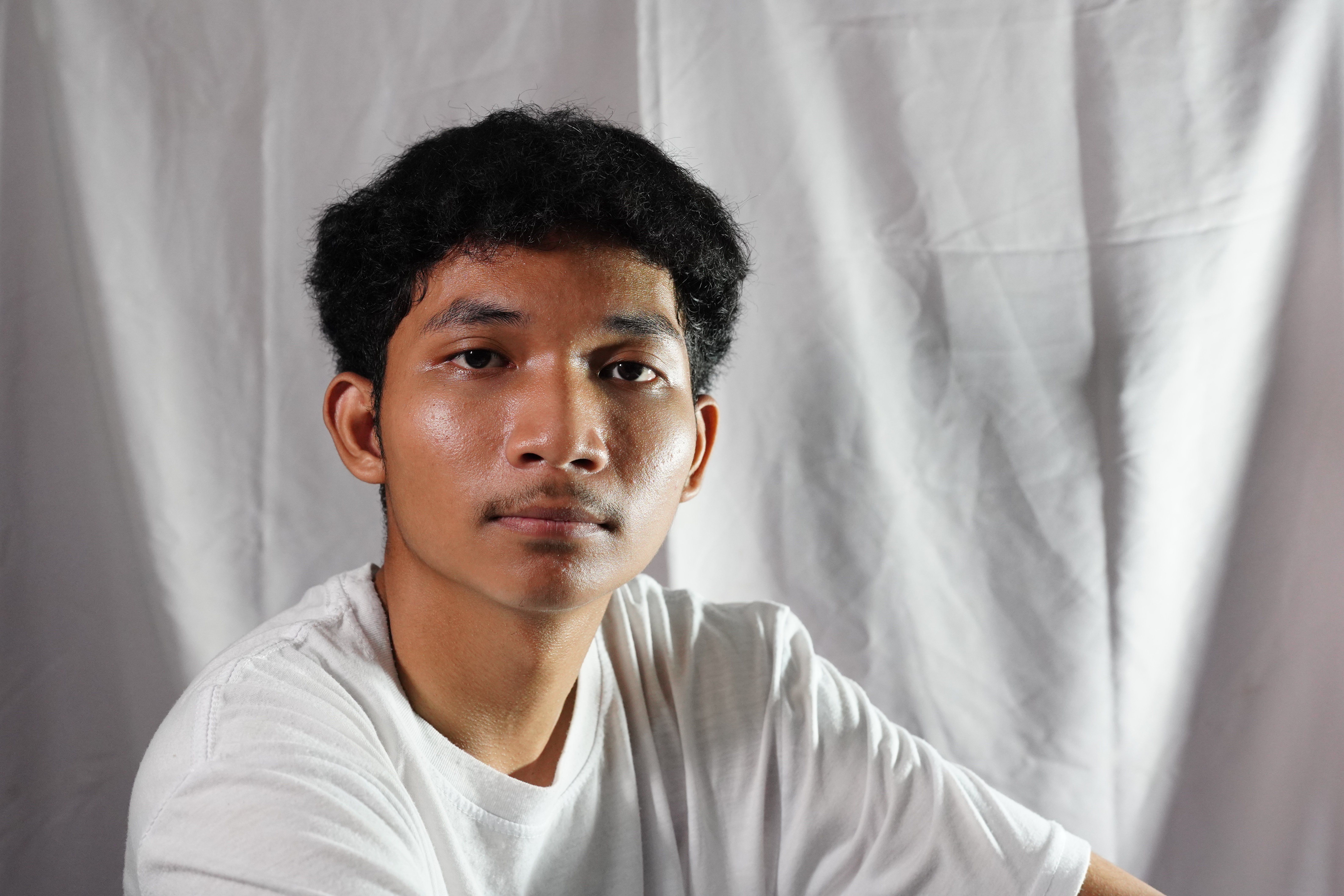 Portrait of a Young Man in White Shirt · Free Stock Photo