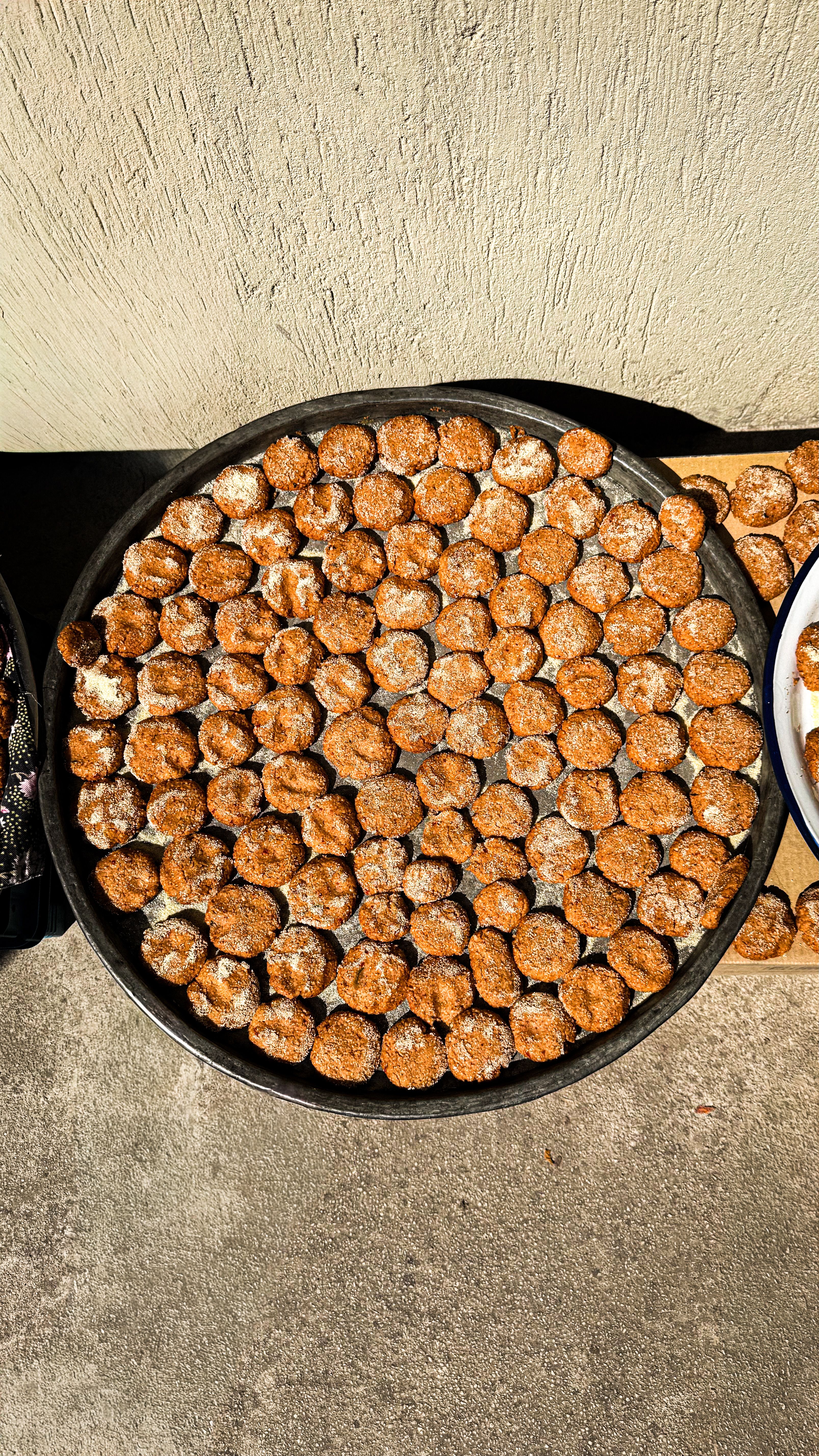 Aerial shot of homemade tarhana drying under the sun, showcasing traditional Turkish cuisine.