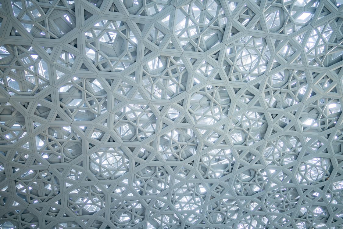 Intricate Geometric Pattern on Modern Ceiling · Free Stock Photo