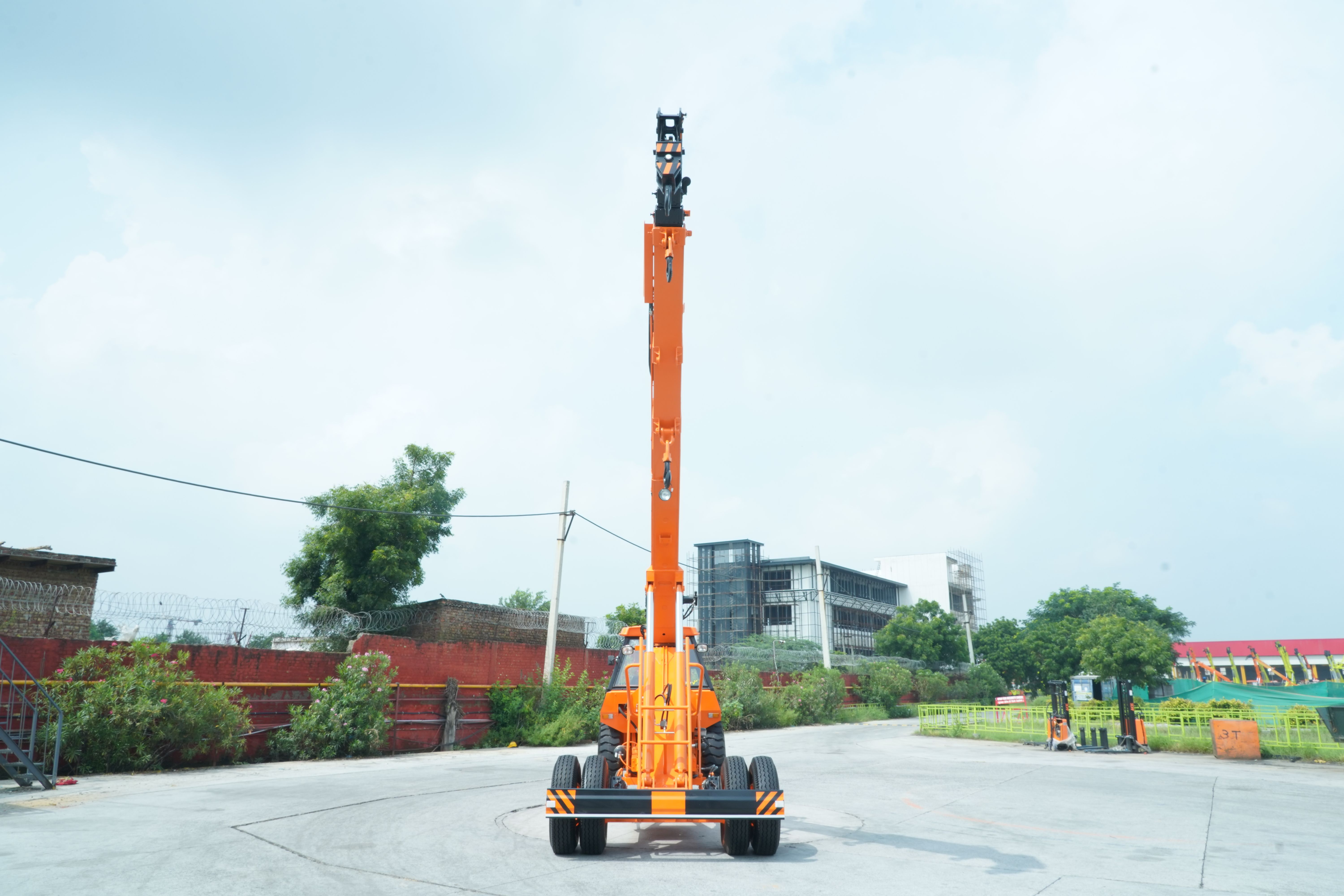 Blacked-out telehandler at festival grounds