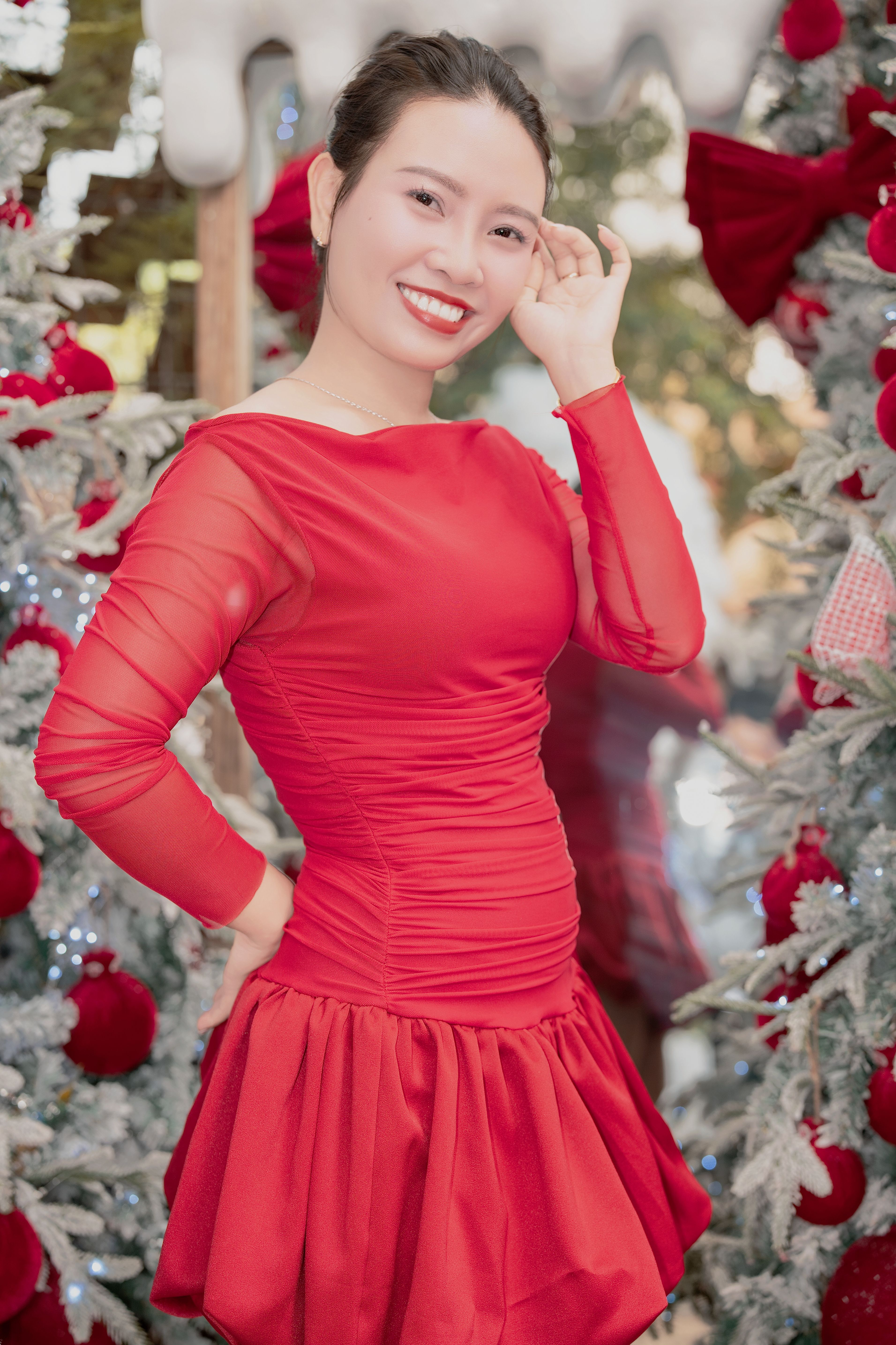 Smiling Woman in Red Dress at Festive Event · Free Stock Photo