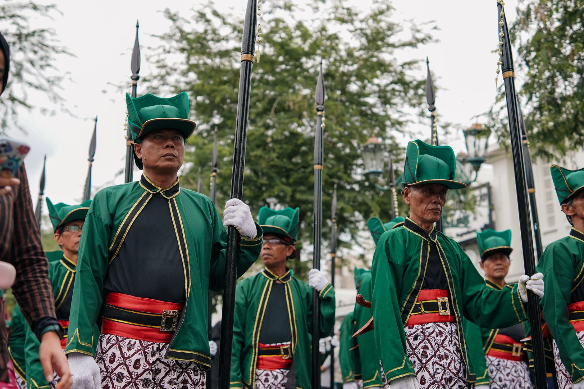Colorful parade in Yogyakarta showcasing cultural heritage and traditional uniforms.