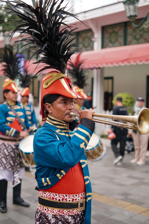 Free Colorful traditional parade with musicians in Yogyakarta, showcasing cultural heritage. Stock Photo