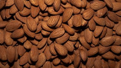 Close-up of raw whole almonds. Photo by Art on Pexels