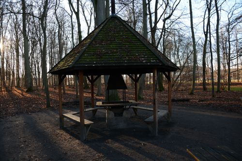 Free Rustic gazebo surrounded by leafless trees in tranquil autumn forest setting. Stock Photo