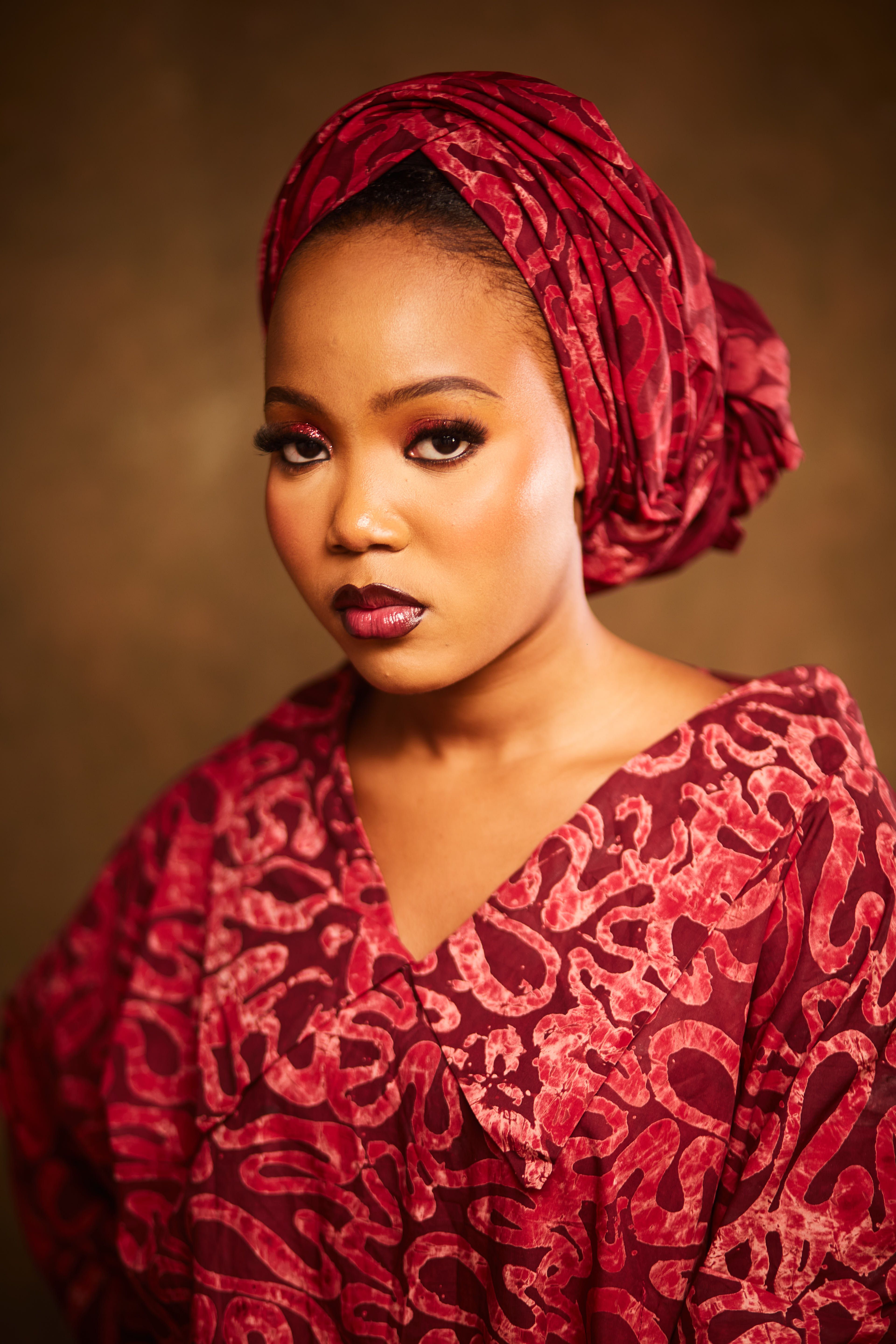 Elegant Portrait of Woman in Red Traditional Attire · Free Stock Photo