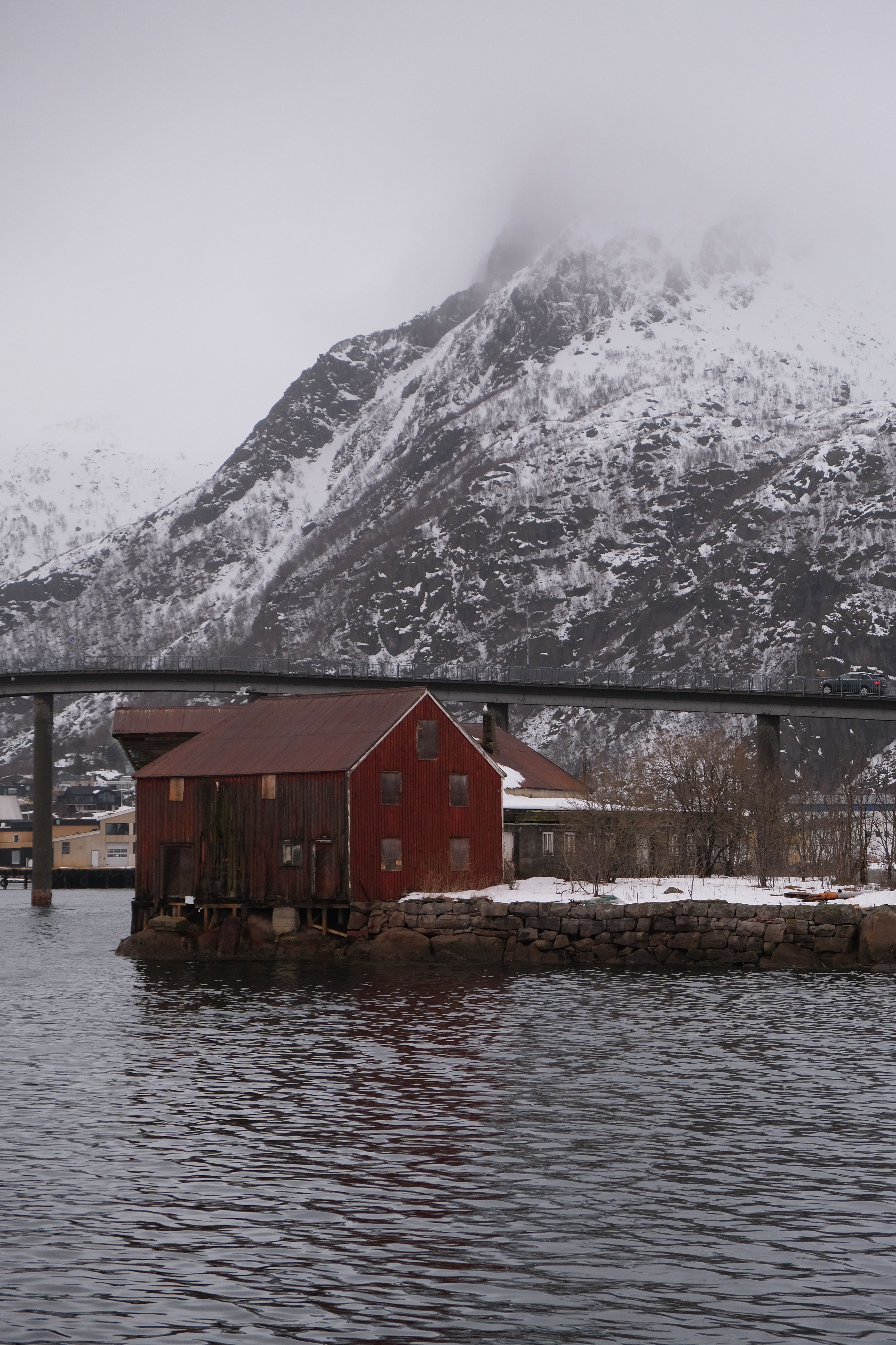 Scenic Winter Landscape with Red Cabin and Snowy Mountains · Free Stock ...