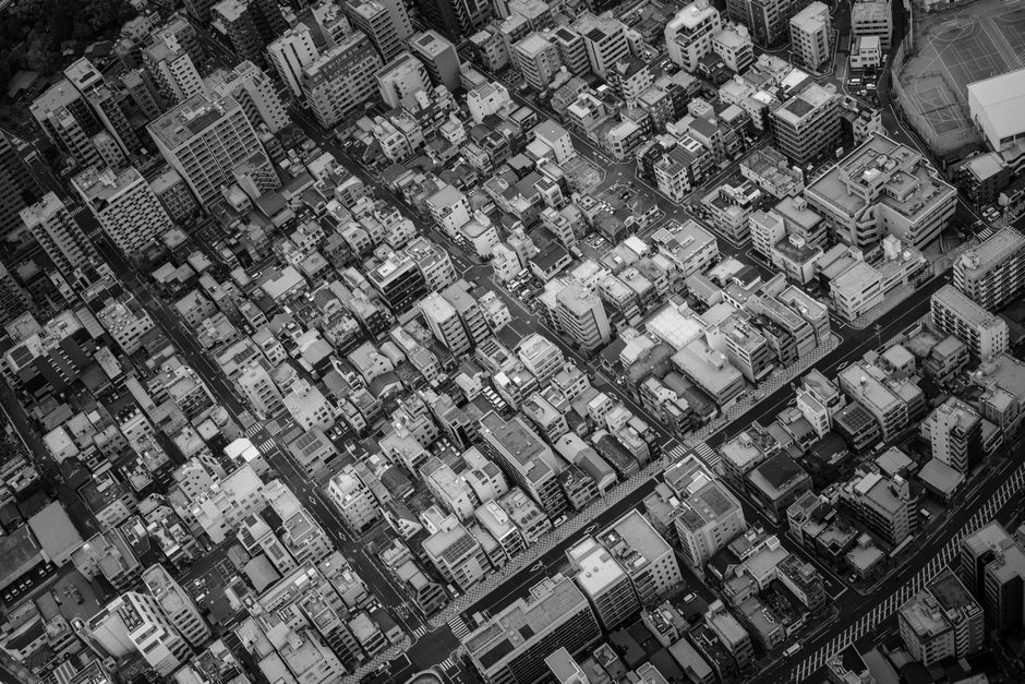 A stunning aerial shot of the dense urban landscape of Tokyo, showcasing intricate architecture and city planning.