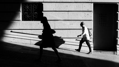 Free Dynamic street photograph featuring shadows in Buenos Aires, Argentina. Stock Photo