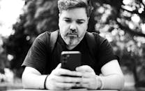 Man Using Smartphone in Buenos Aires Park