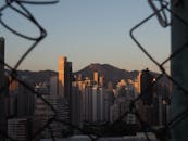 Hong Kong Skyline with Lion Rock at Sunset