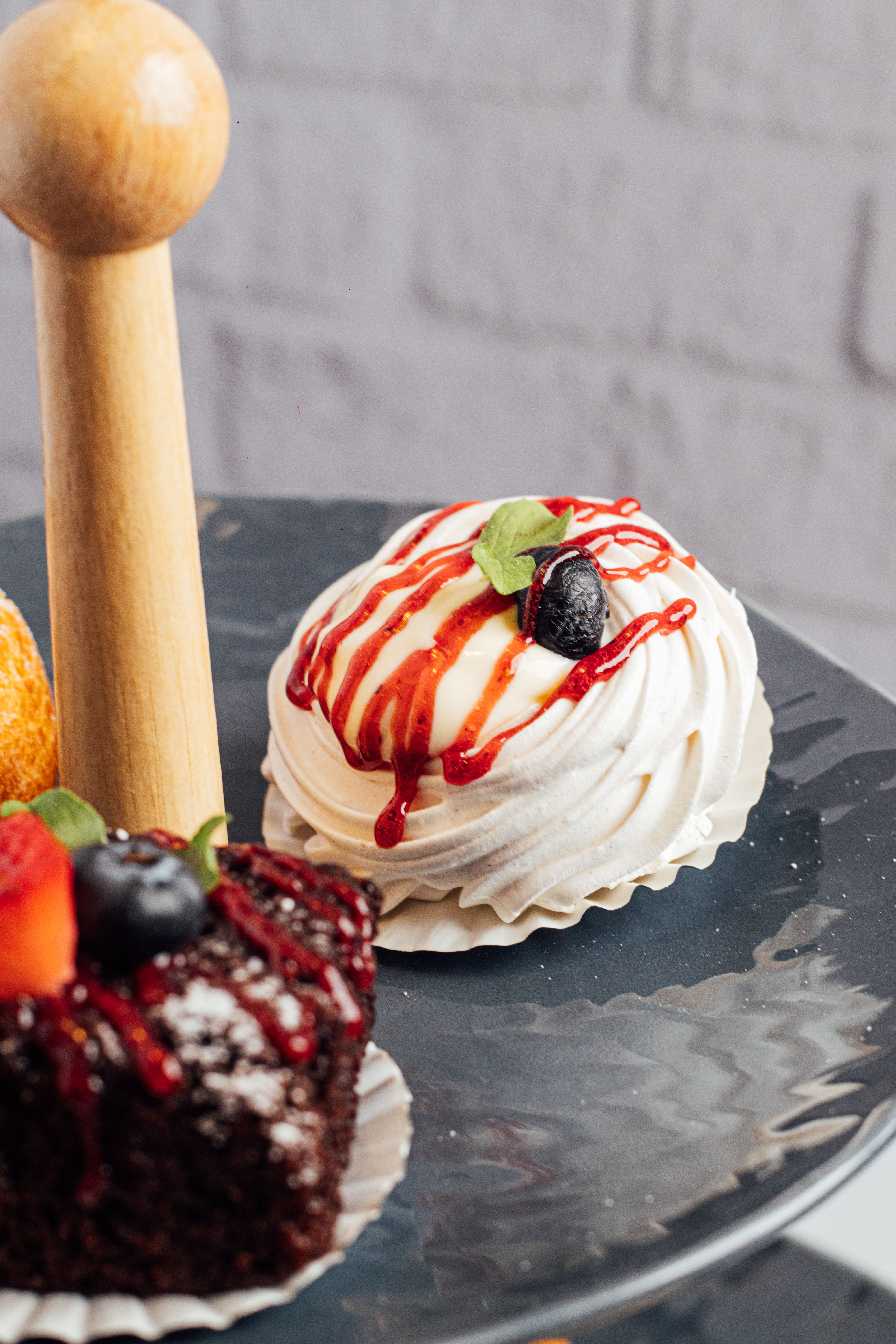 Delicious Dessert Plates with Rich Handcrafted Sweets · Free Stock Photo