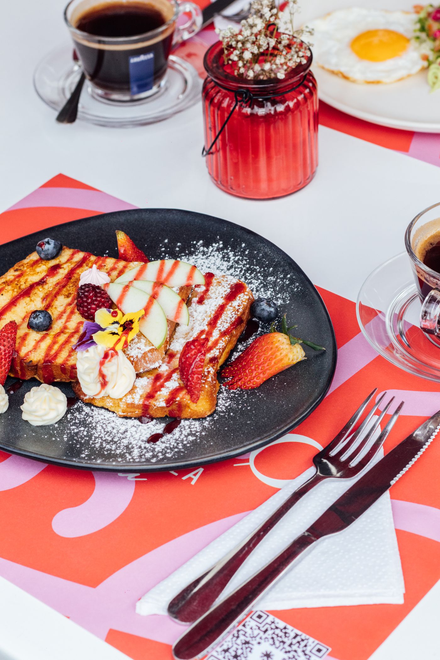 French toast with berries and coffee arranged for a brunch