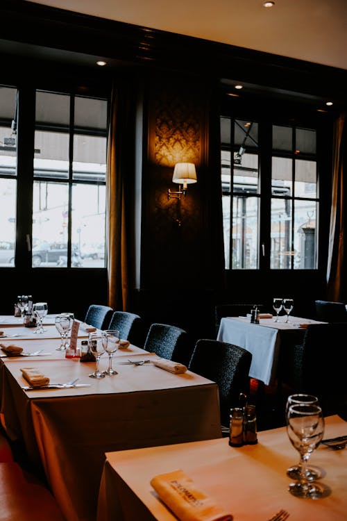 Four Black Chairs Beside Table