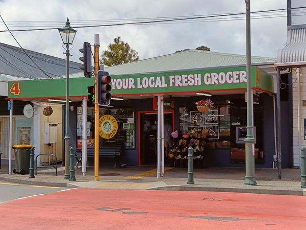 Charming local grocery store in Wellington, New Zealand, showcasing community atmosphere.
