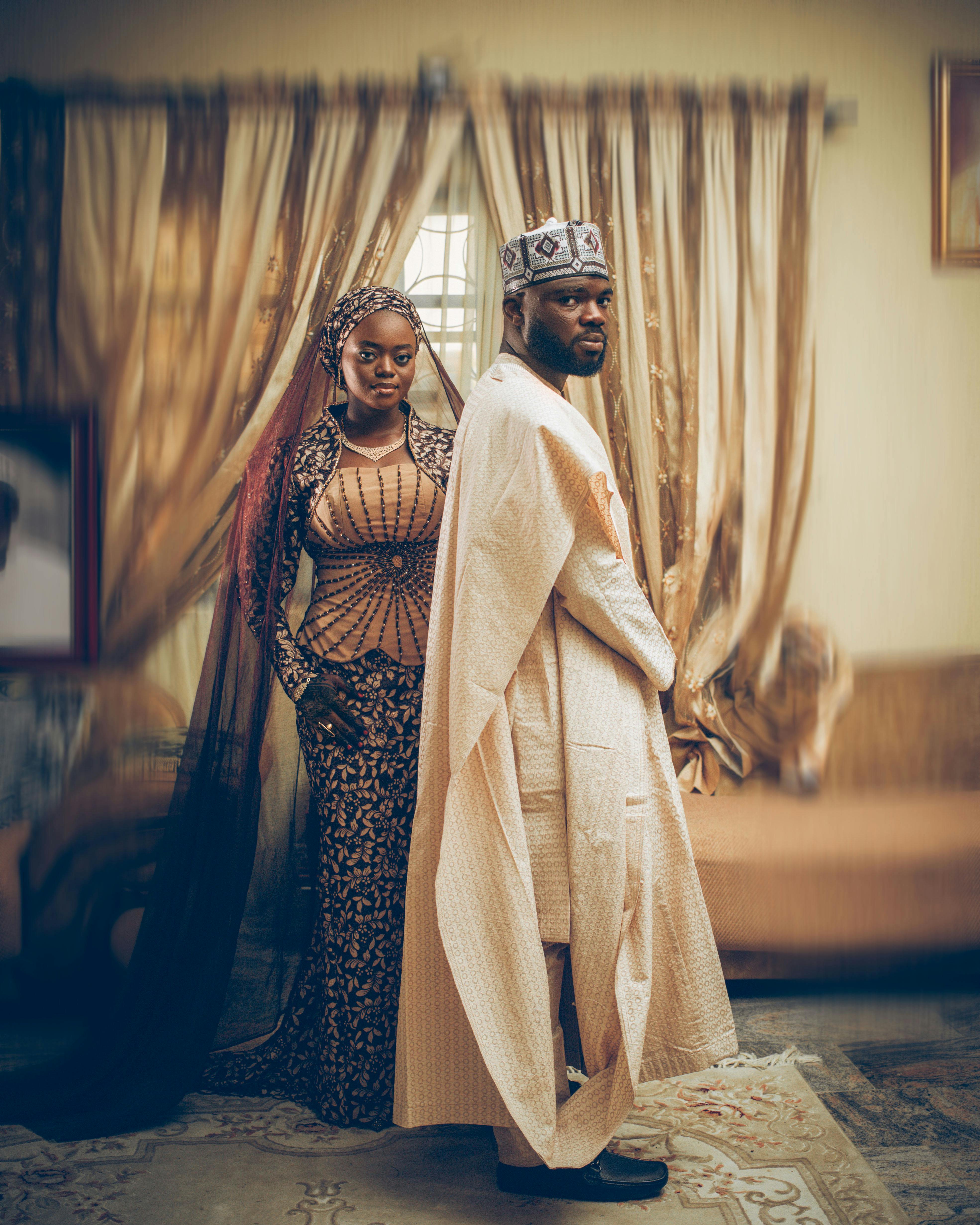 Traditional African Wedding Couple in Elegant Attire · Free Stock Photo, image size:3939x4923