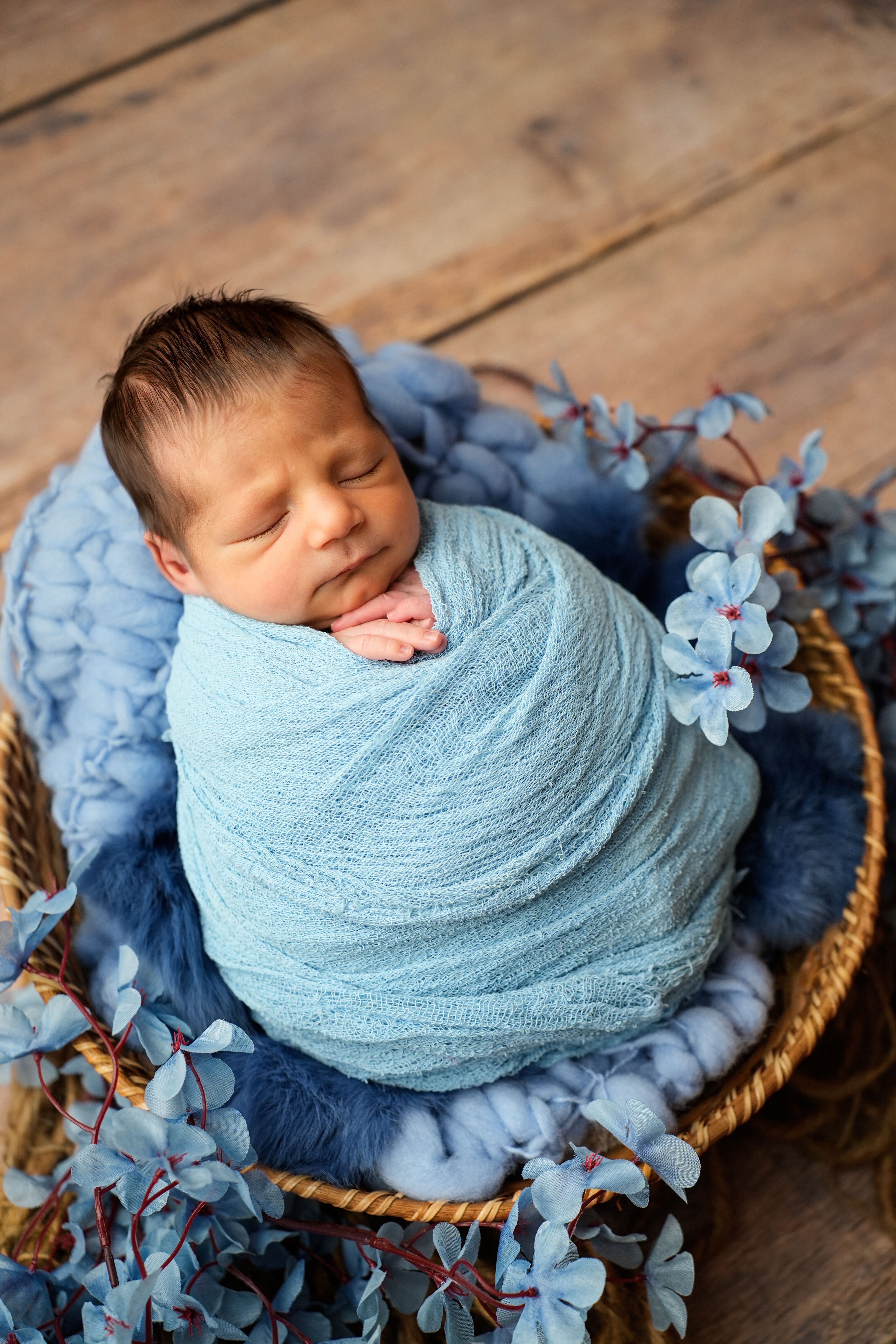 Newborn Baby Wrapped in Soft Blue Blanket · Free Stock Photo