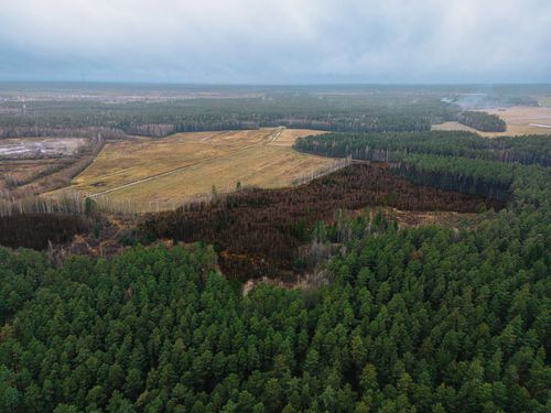 Free Stunning aerial view of a forest and field landscape in Vileyka, Minsk Region, Belarus. Stock Photo