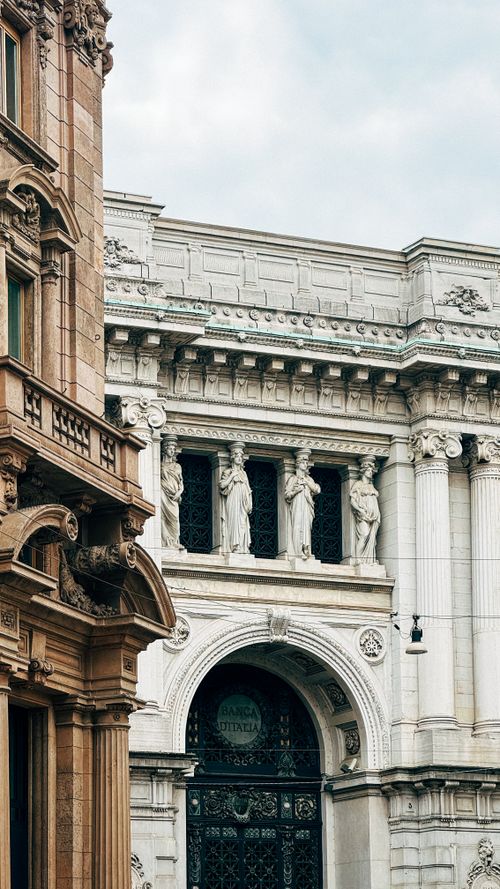 Free Detailed view of classic stone architecture with sculptural columns and intricate carvings, ideal for historical context. Stock Photo