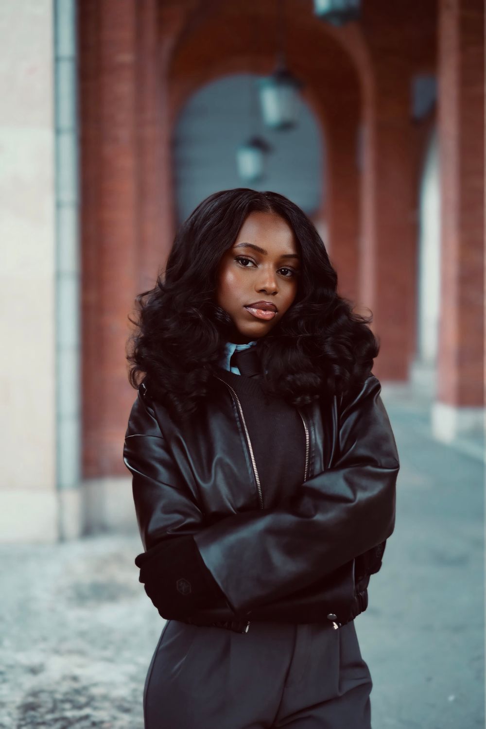 Stylish Woman Posing in Urban Setting · Free Stock Photo