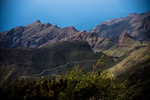 Free A breathtaking landscape of rugged mountains and ocean in Tenerife, Canary Islands. Stock Photo