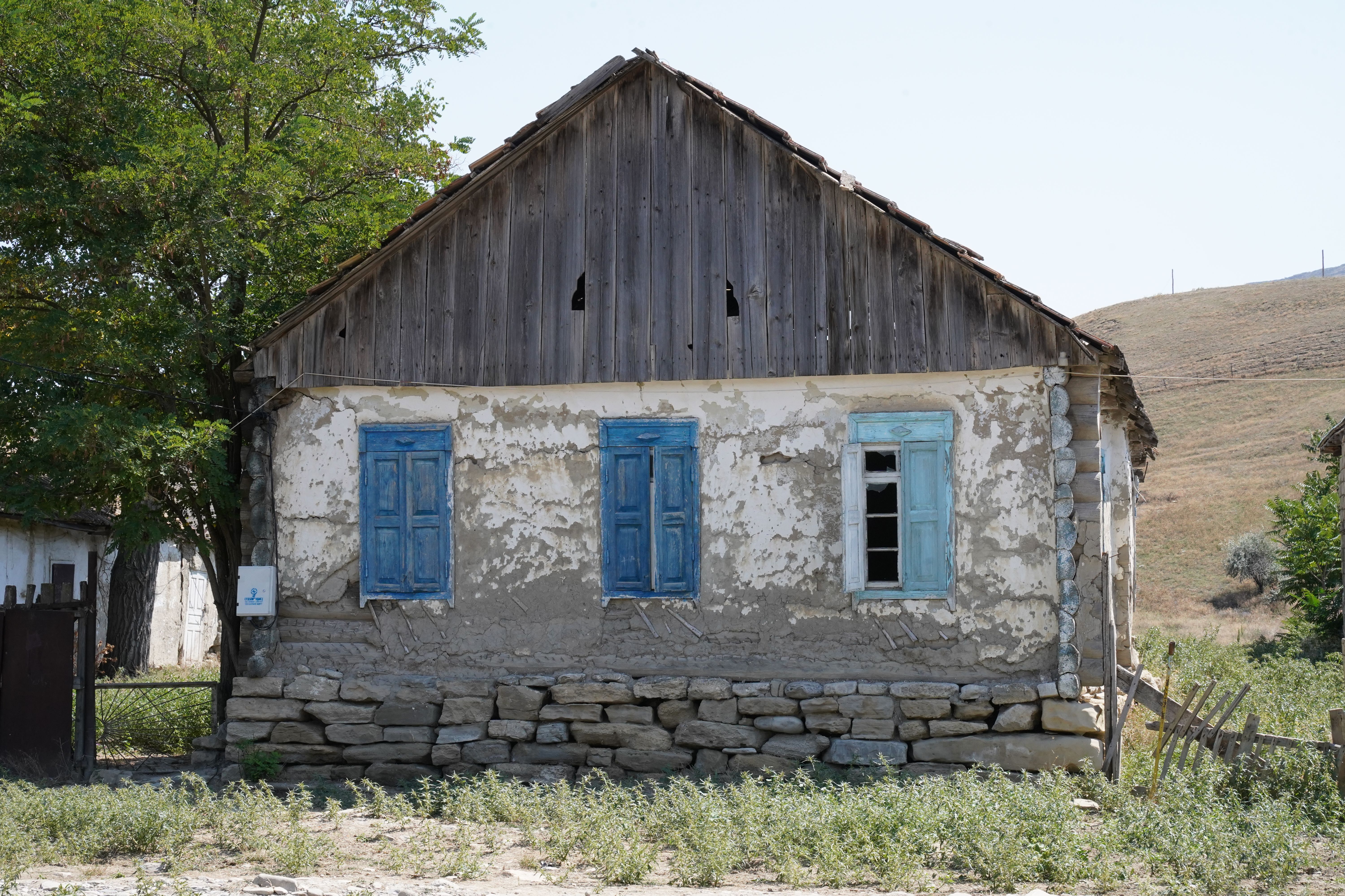 Rustic Old House with Blue Shutters · Free Stock Photo