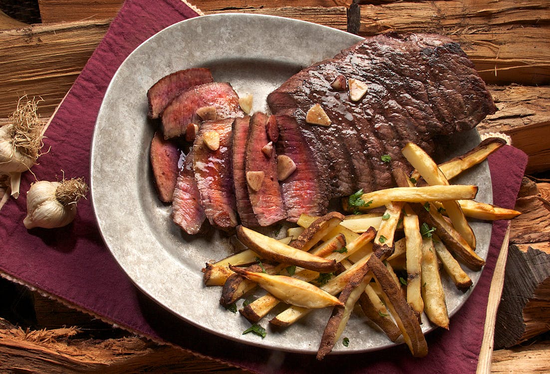 Free Photo of Steak and French Fries on Gray Plate Stock Photo