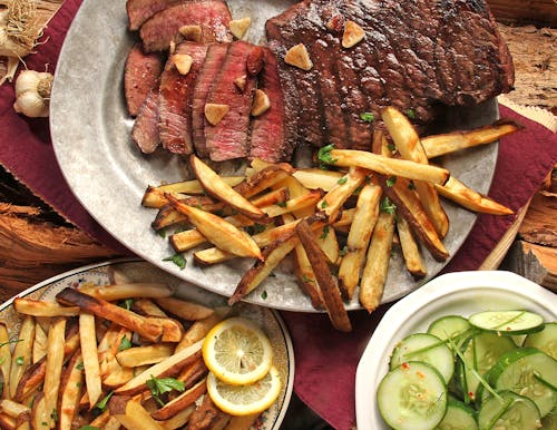 Steak and French Fries on Gray Plate